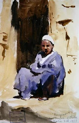 Un garçon assis dans un temple à Philae