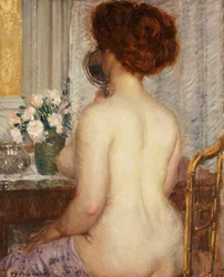 Femme à une coiffeuse