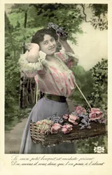 Fille avec des fleurs à vendre