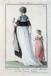 Mode sous le Directoire : jeune élégante parisienne portant la coiffure Titus, manteau de gaze avec dentelle. 1797. Paris, musée du costume