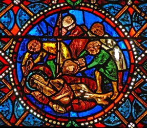 Fenêtre s4 représentant une scène de la vie de Sainte Agathe; la sainte rôtie vive