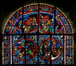 Fenêtre w12-L représentant des anges portant des âmes au Paradis; panneau fragmentaire - un évêque? le Sein d