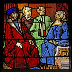 Fenêtre w17 représentant la Vie de Saint Remi. 2 hommes et 2 femmes assis