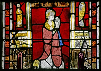 Donateur prêtre; bordure architecturale