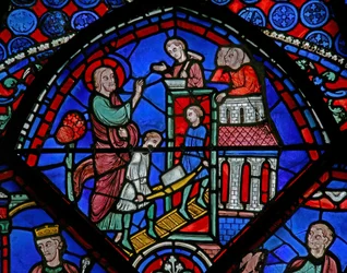 Fenêtre w23 représentant une scène de la vie de Saint Thomas : le saint construit une église