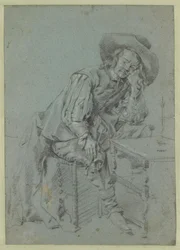 Un homme assis avec une pipe