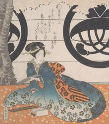 Femme assise sous un cerisier sur le point d