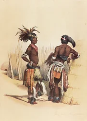 Deux jeunes Zoulous, parés de tenues traditionnelles vibrantes