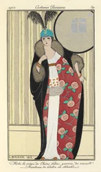 "Robe de crêpe de Chine blanc garnie de renard. Manteau de loutre et skunks"