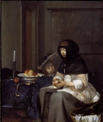 Une mère épluchant une pomme