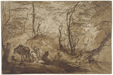 Sur un chemin forestier, un cheval tire un arbre d