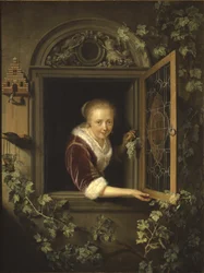 Jeune femme à la fenêtre avec une grappe de raisins, 1622