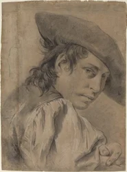 Un Jeune Homme avec un Large Chapeau