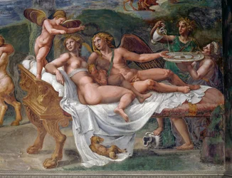 Cupidon et Psyché avec leur fille Voluptas (Plaisir) allongés sur un lit, détail du Festin de noces ou Banquet des dieux, fresque de Giulio Romano (1499-1546), Palazzo Te, Mantoue (Liste du patrimoine mondial de l