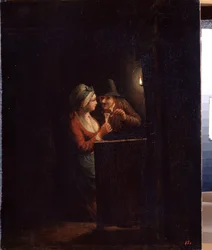 Un homme et une femme à la lueur d