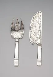Pelle à poisson et fourchette