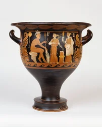 Un cratère en cloche campanien par le peintre Ca représentant un guerrier assis et deux femmes, 4ème siècle av. J.-C.
