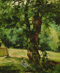 Femme assise sous un arbre