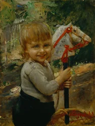 Garçon avec cheval à bascule
