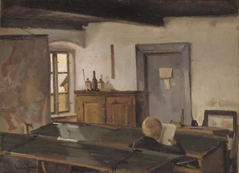 Une salle de classe avec un garçon lisant