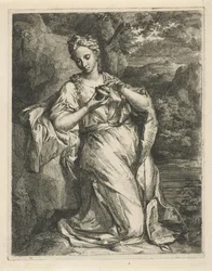 Femme avec un flacon de parfum