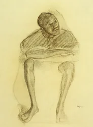 Homme assis sur une chaise