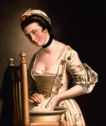 Une femme qui fait la lessive