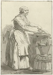 Femme nettoyant du poisson