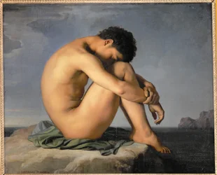 Jeune homme nu assis au bord de la mer ...