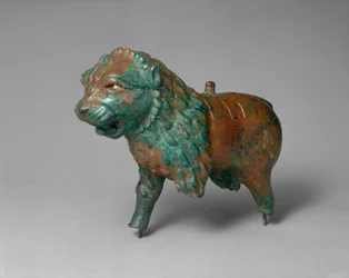 Figure de lion, c. début à milieu du 1er millénaire av. J.-C. (alliage de cuivre)