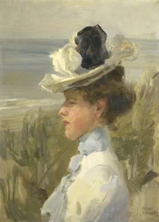 Jeune femme regardant la mer