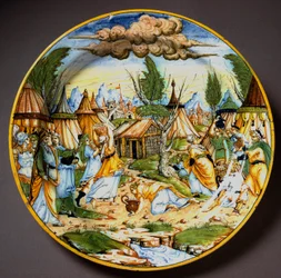 Juifs dans le désert (ou la récolte de la manne). Dieu nourrit les Israélites, qui autrement mourraient de faim, avec des œufs de caille et de la manne (Manne). Plat en céramique de l