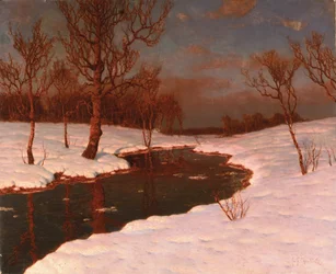 Coucher de soleil sur une rivière enneigée