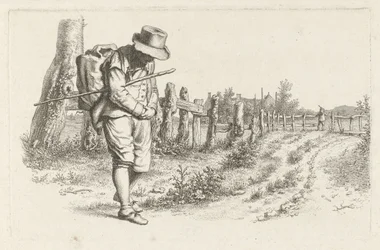 Voyageur sur un chemin de campagne