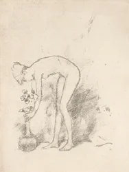 Un modèle nu arrangeant des fleurs
