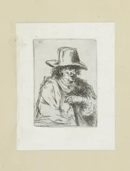 Homme avec un haut-de-forme et une canne