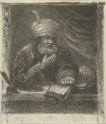 Homme avec turban derrière un bureau