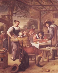 Compagnie joyeuse sous une crèche