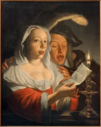 Couple chantant à la lumière des bougies