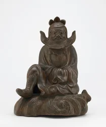 Figure de Shoki, le dompteur de démons, assis sur un rocher, Imbe, préfecture d