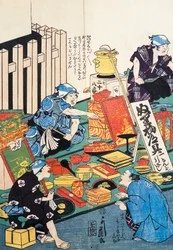 Étal avec boîtes, éventails, livres et kakemonos