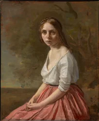 Jeune femme en jupe rose
