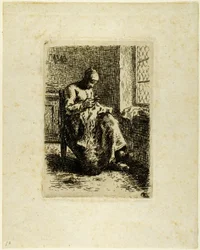 Une femme cousant