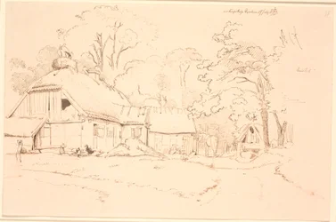 Maison de paysan avec un nid de cigognes sur le toit
