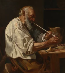 Vieil homme allumant une pipe