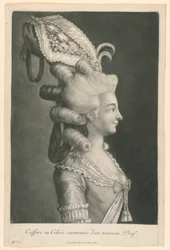 Coiffure au Colisée surmontée d