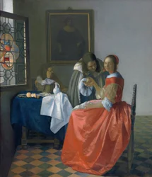 Jeune femme avec un verre de vin