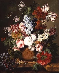 Fruits et fleurs sur un rebord de marbre