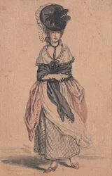 Une dame de mode avec un châle noir et des chaussures rouges