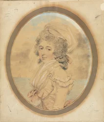 Jeune femme avec un nœud rose sur le corsage